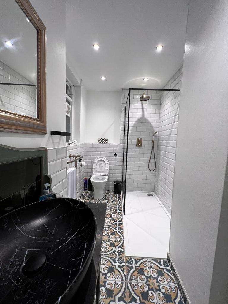 Апартаменты Earl's Court Luxe Лондон